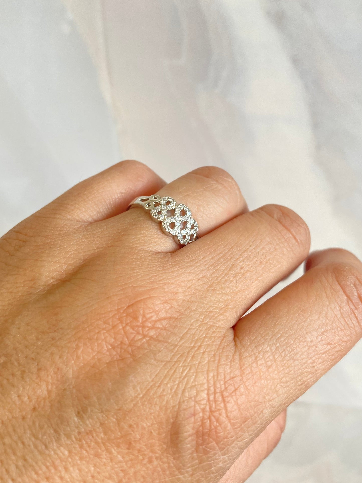 Anillo cintillo infinito rodio plateado y microcircones
