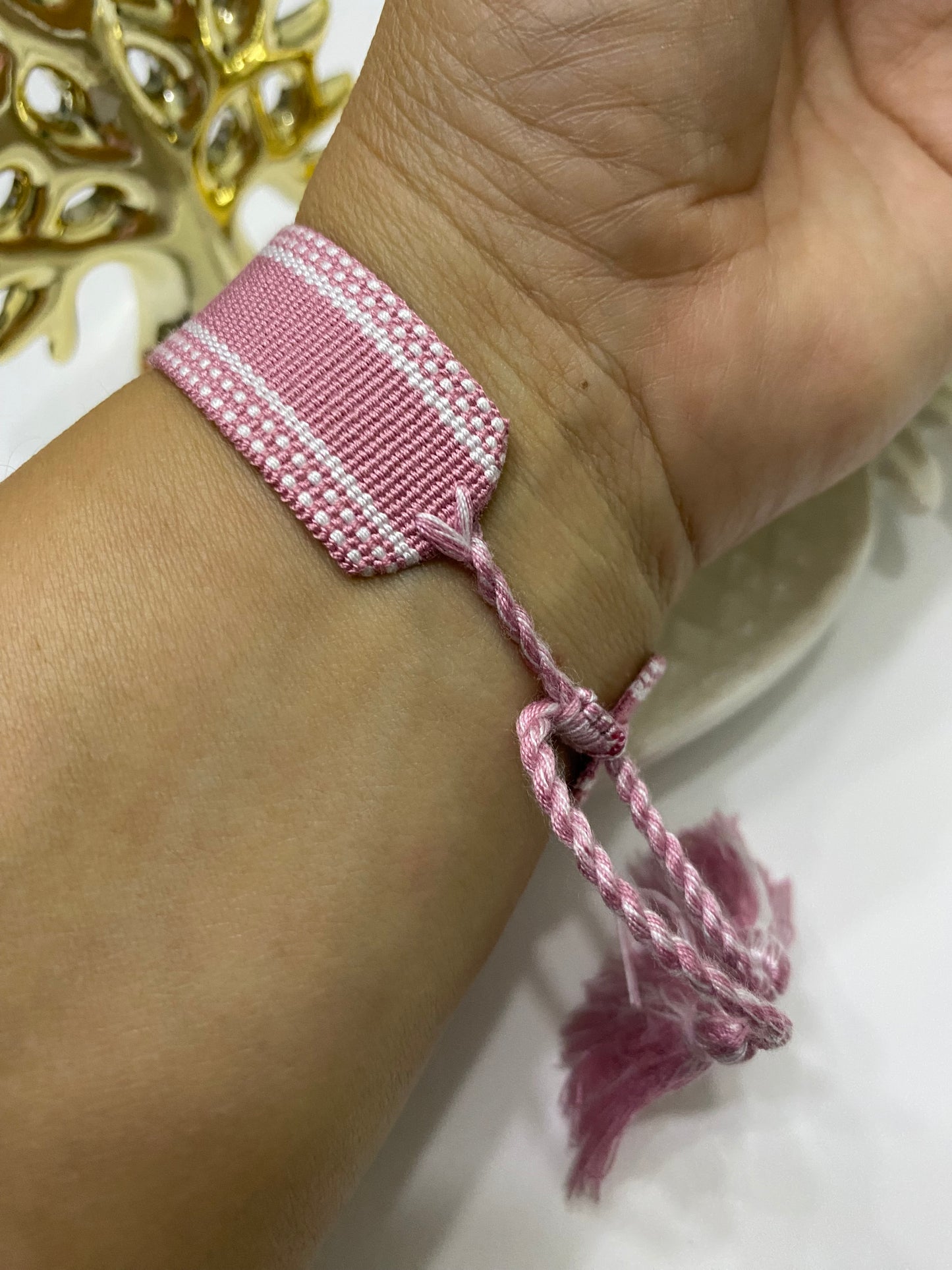 Pulsera Fe Esencial tejida rosada