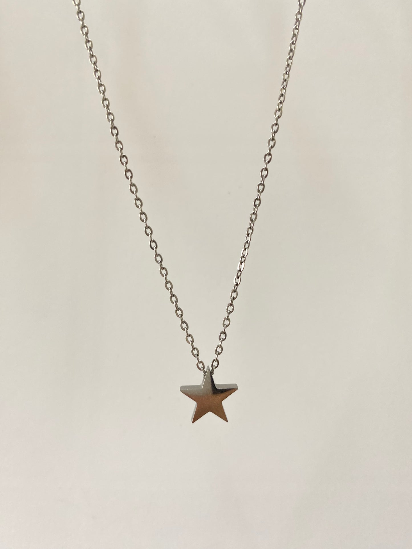 Collar Estrella acero plateado