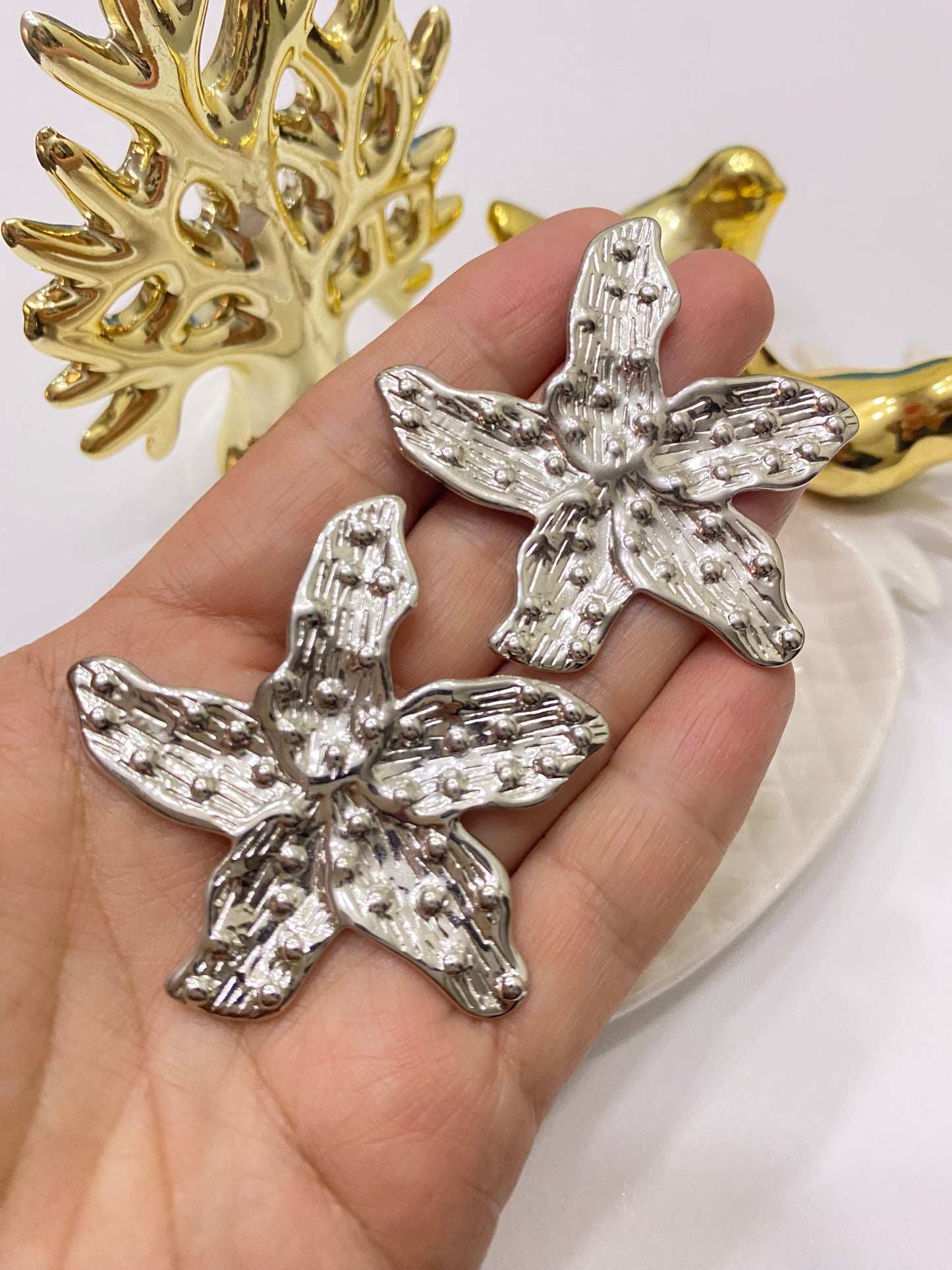 Aros Flor acero plateado textura