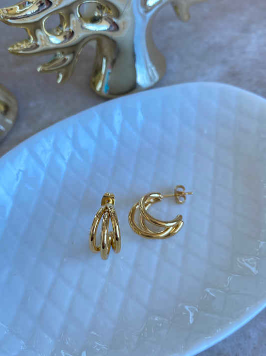 Aros Trinidad acero dorado