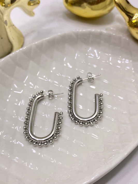 Aros acero argolla plateada con mini balinés