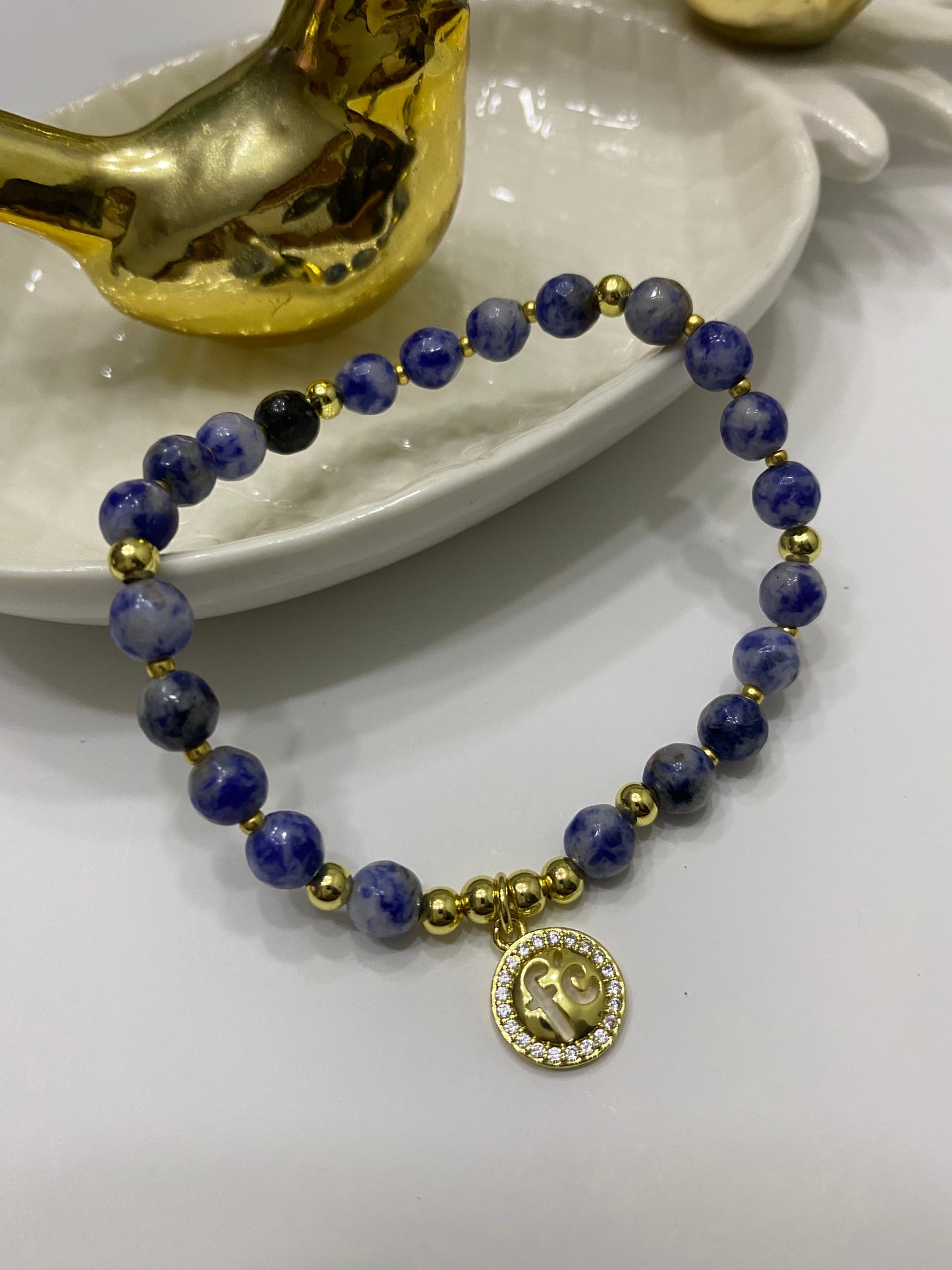 Pulsera Fe Lapizlázuli  baño de oro