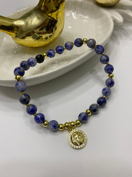 Pulsera Fe Lapizlázuli  baño de oro