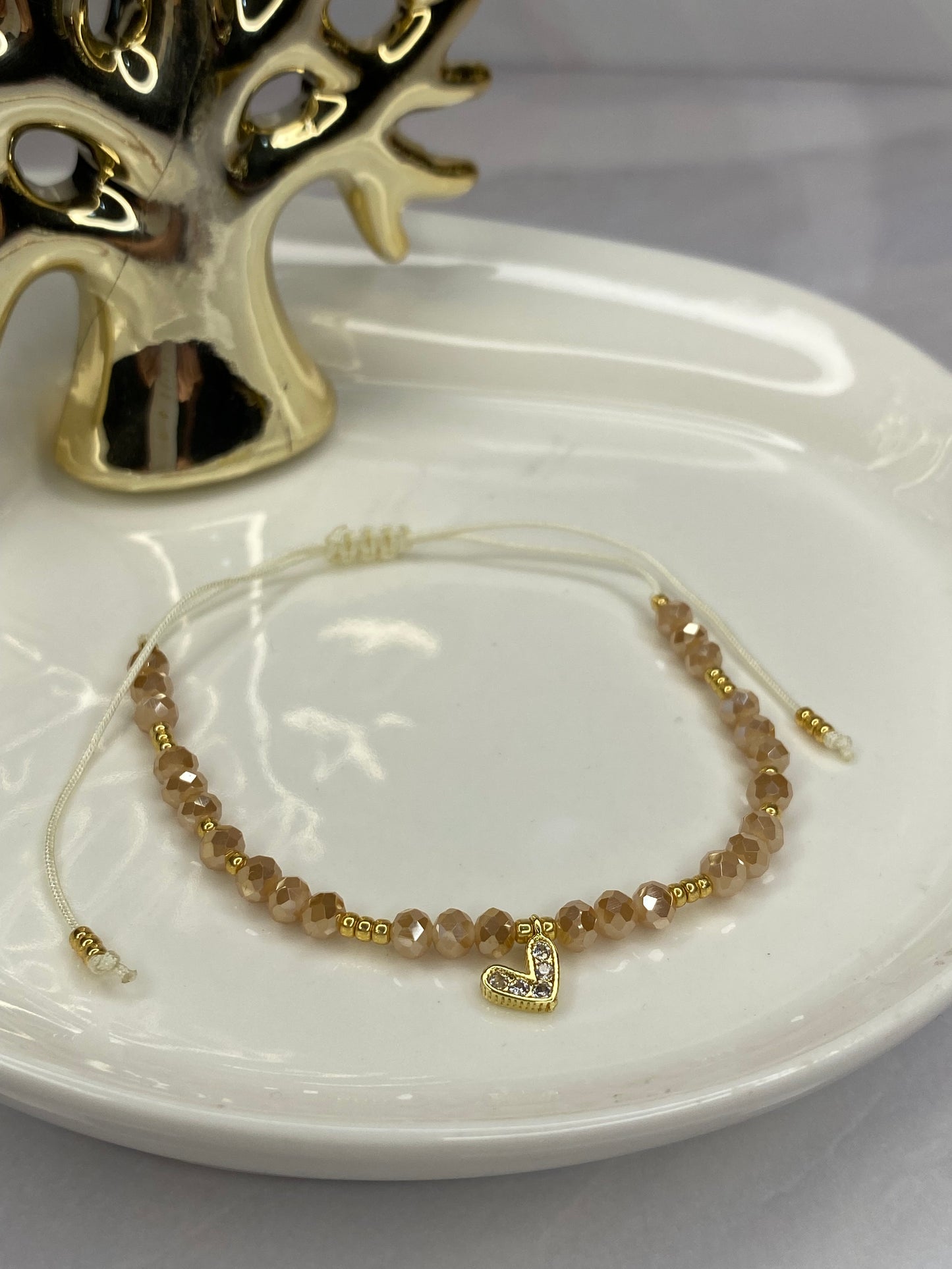 Pulsera amor  y cristal beige  aguamarina ajustable