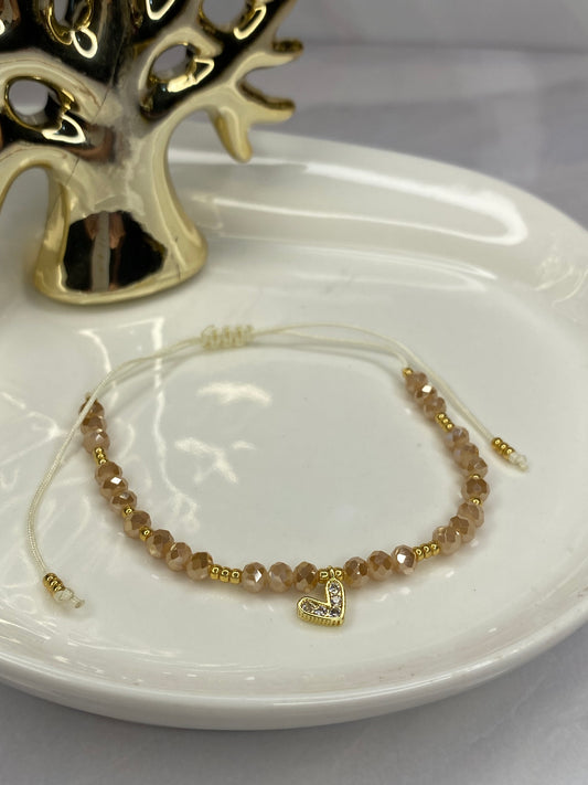 Pulsera amor  y cristal beige  aguamarina ajustable