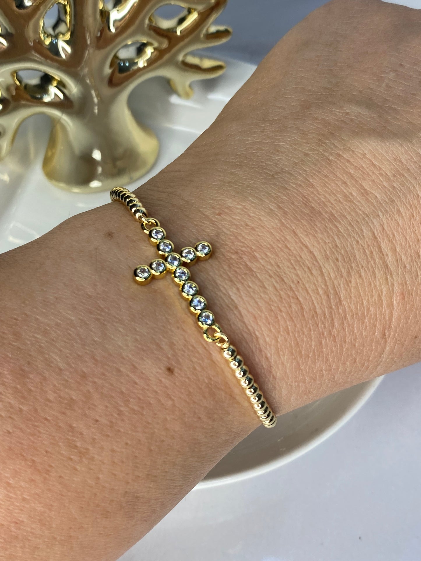 Pulsera cruz con circones engastados ajustable