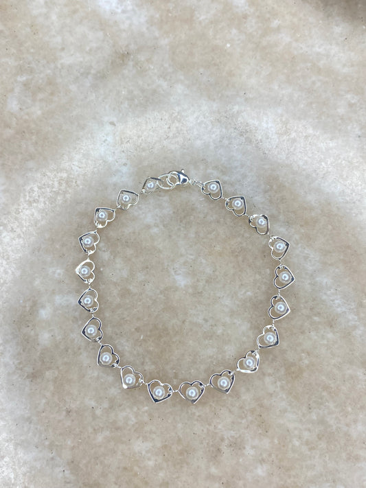 Pulsera corazones con Perlas baño de oro