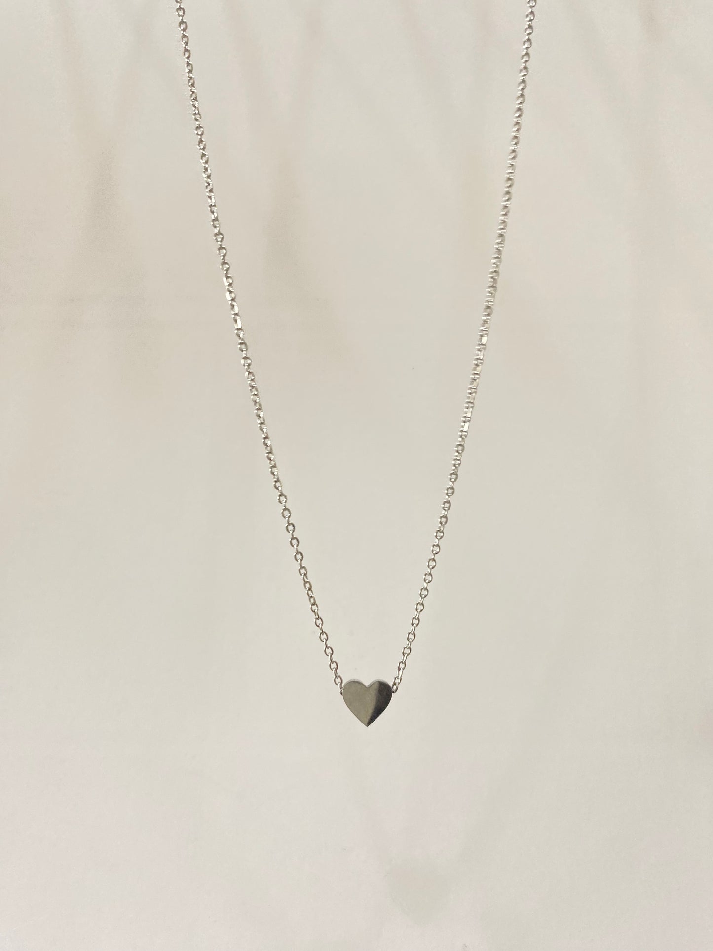 Collar corazón  plateada acero