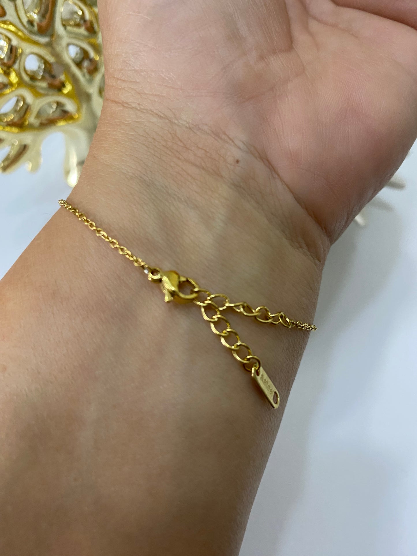 Pulsera corazón  de acero dorado