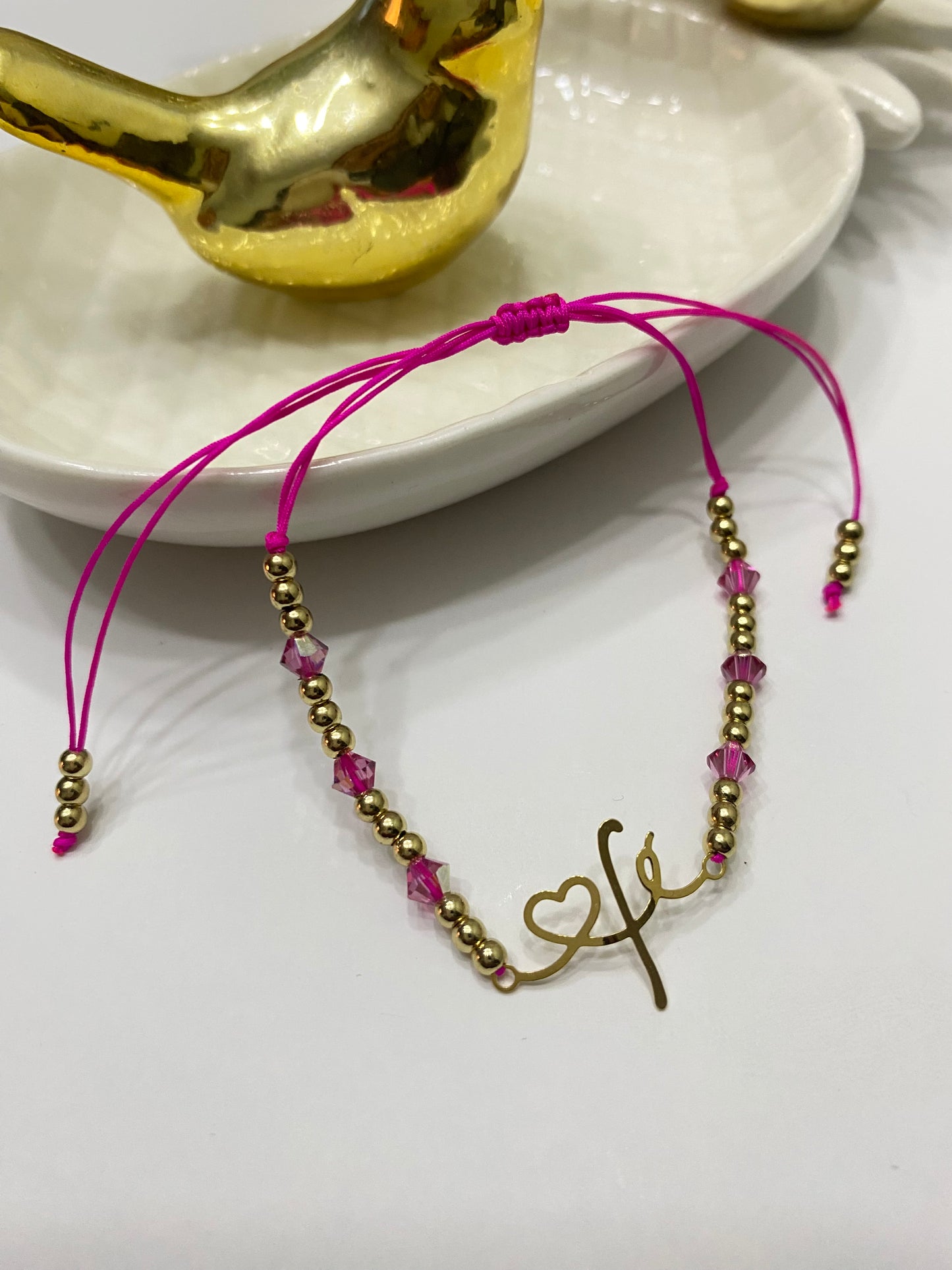 Pulsera Fe y cristales Swarovski fucsia • ajustable