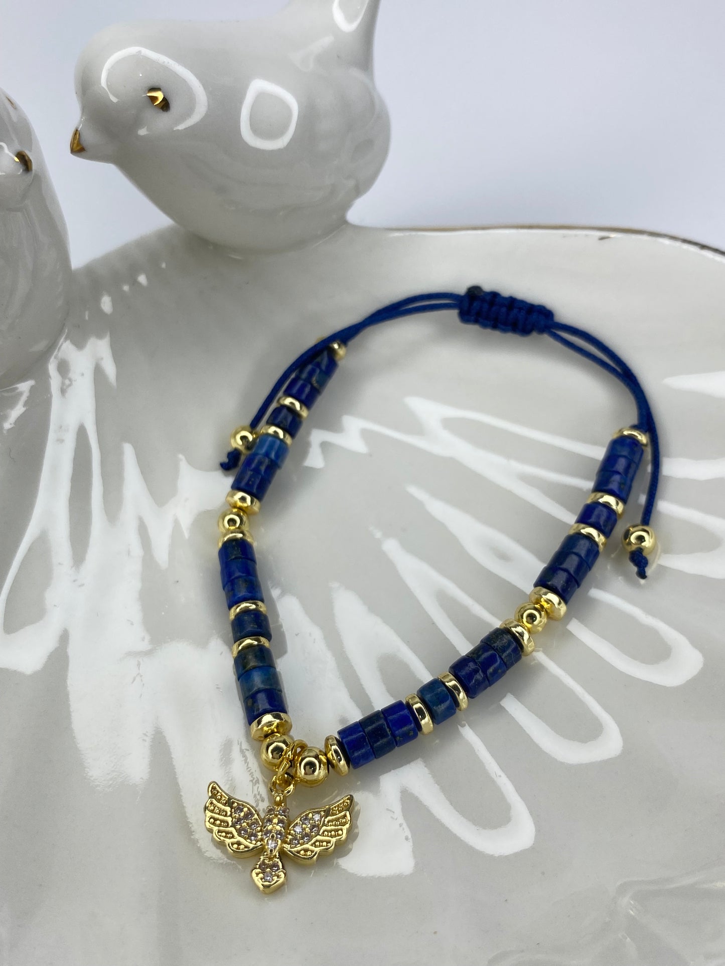 Pulsera Espíritu Santo  piedra lapislázuli ajustable y baño oro