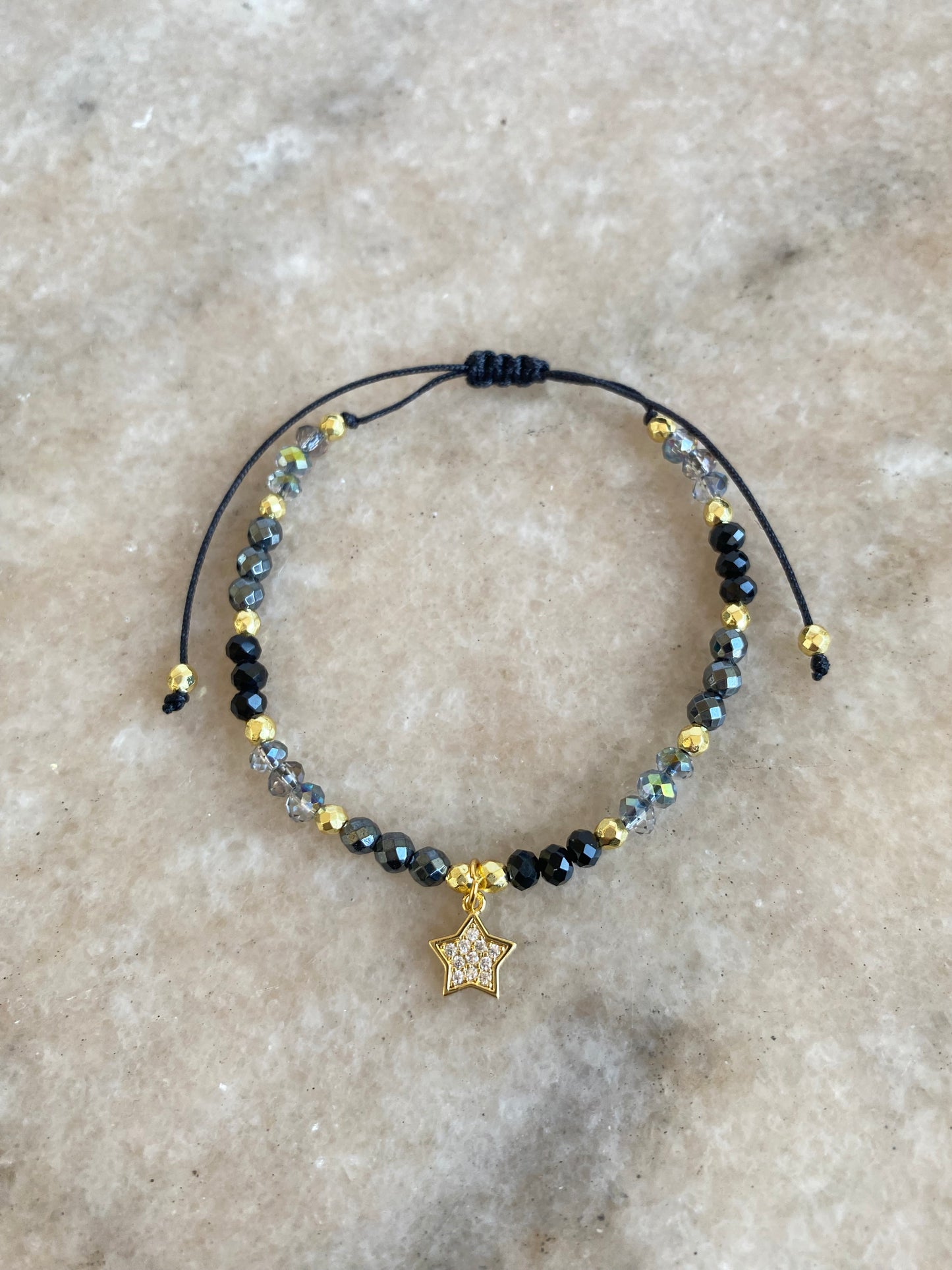 Pulsera Estrella dorada y Cristal ajustable