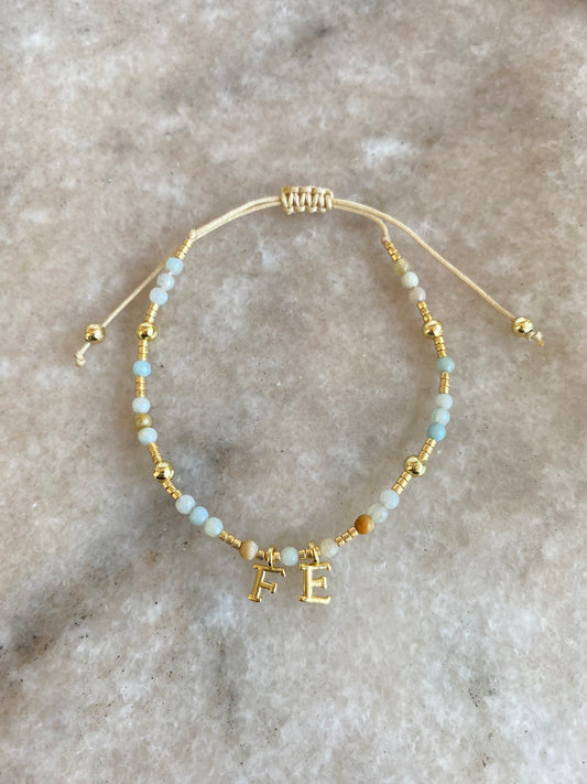 Pulsera Fe y piedras naturales aguamarina ajustable
