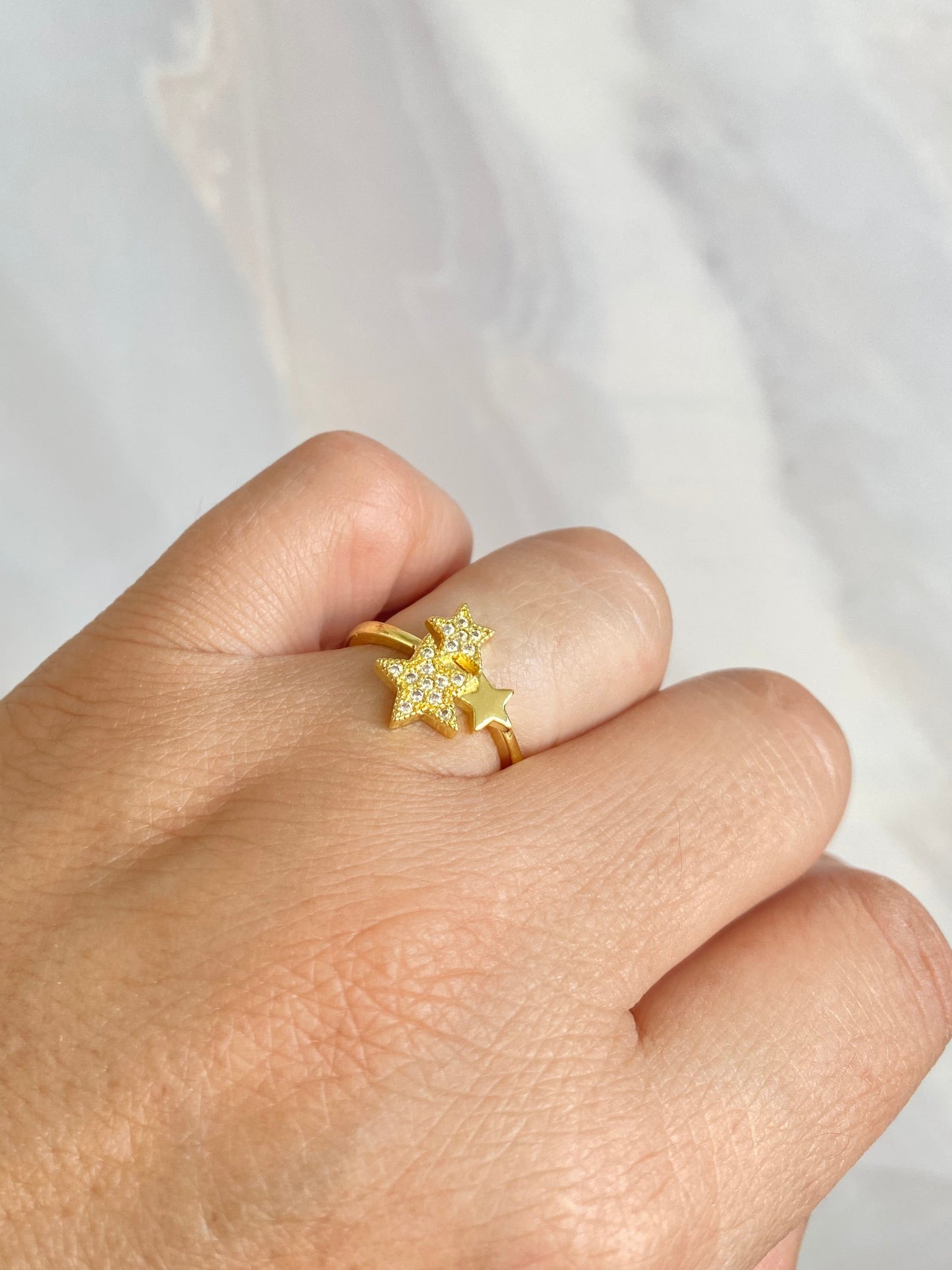 Anillo ajustable 3 Estrellas rodio dorado y microcircones
