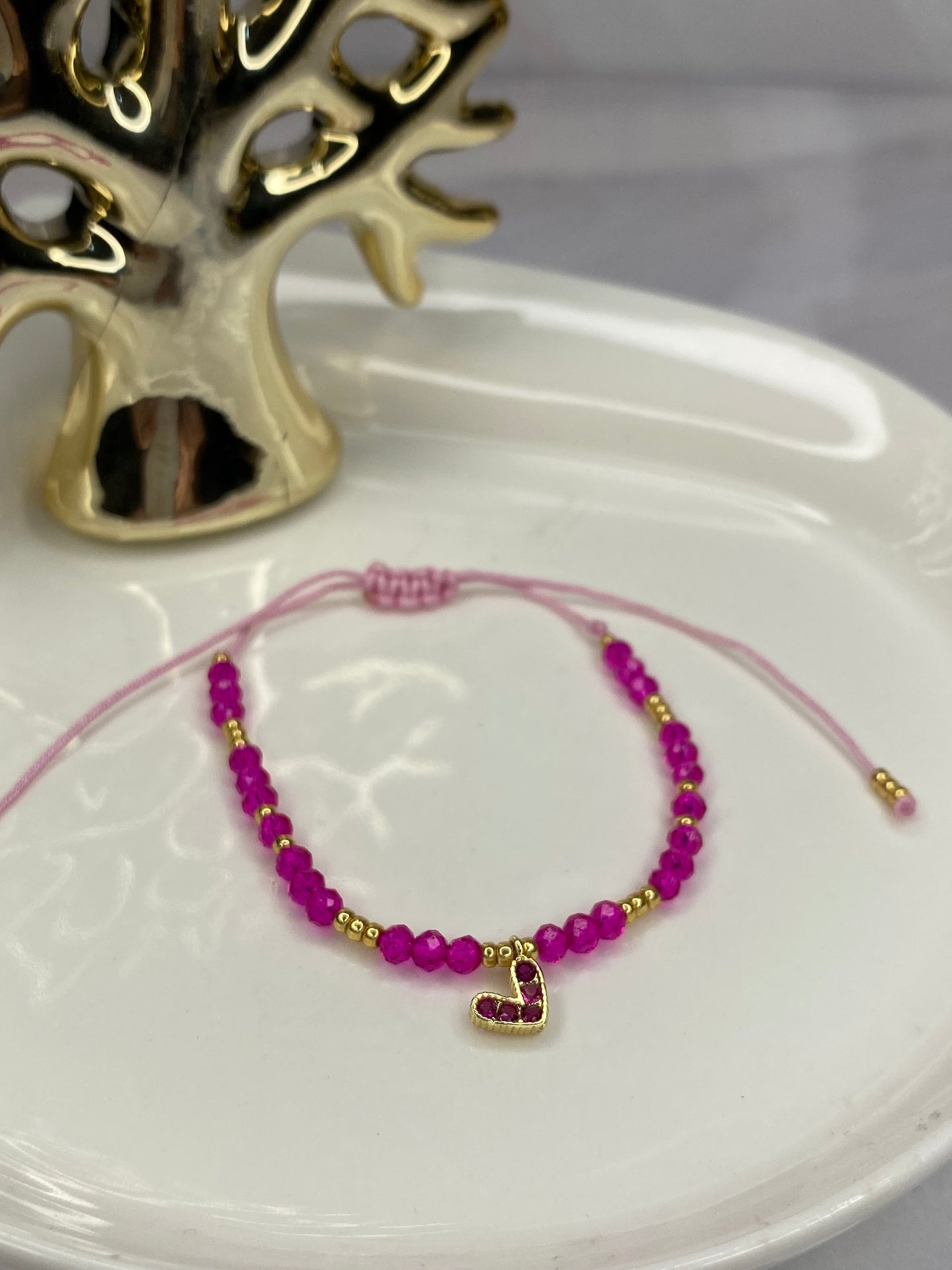 Pulsera amor y cristal fucsia ajustable