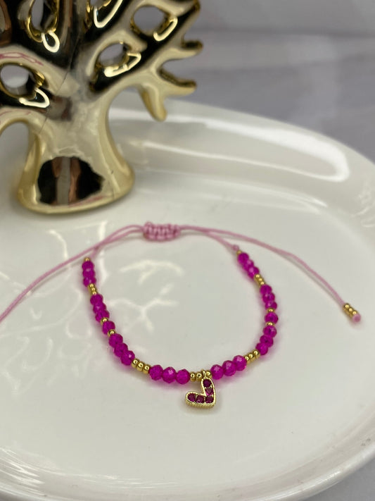 Pulsera amor y cristal fucsia ajustable