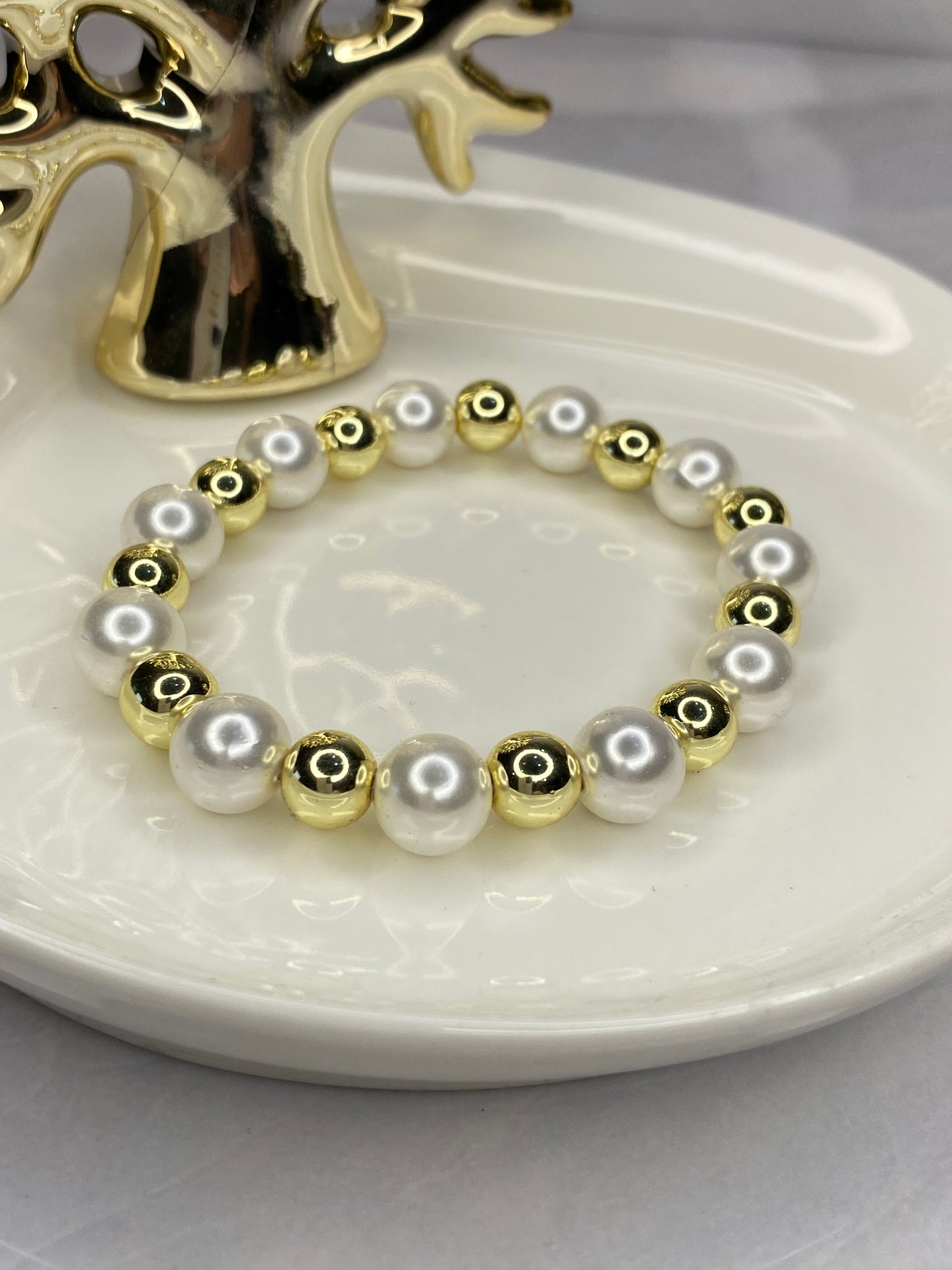Pulsera Perlas Shell y hematita dorada
