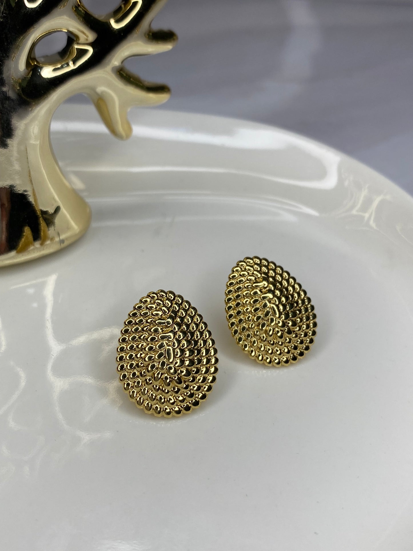 Aros escudo ovalo acero dorado