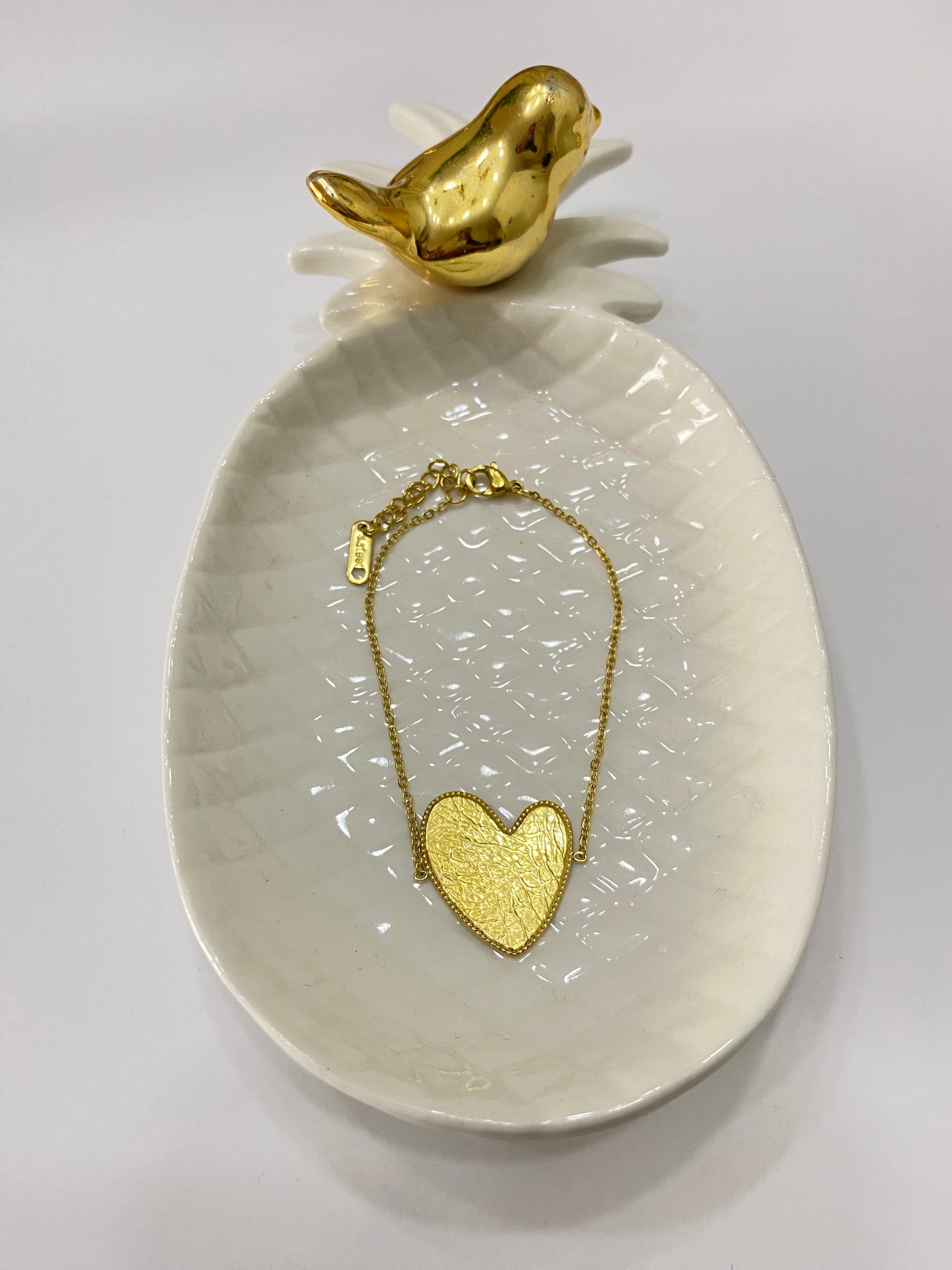 Pulsera corazón  de acero dorado