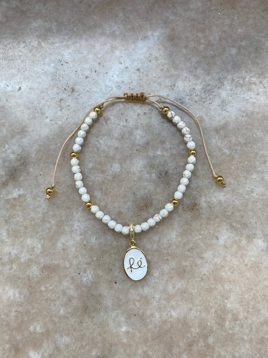 Pulsera Fe ovalo blanco con piedras beige ajustable