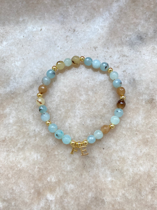 Pulsera Fe y piedras naturales aguamarina